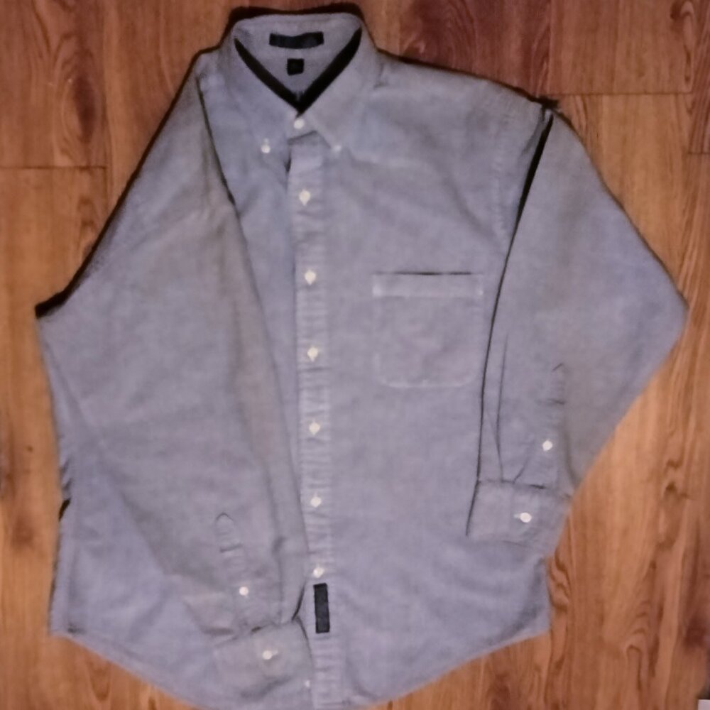 Light blue oxford button down long sleeve shirt.